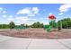 playground with slides, climbing structures, and a wood-chip surface at 12261 Stuart Dr, Venice, FL 34293