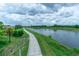 Scenic paved walkway alongside a canal at 196 Stanford Rd, Venice, FL 34293