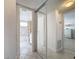 Clean bathroom with tiled floors and a shower/tub combo at 210 Park N Blvd # 129, Venice, FL 34285