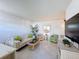 Bright living room with comfy seating at 210 Park N Blvd # 129, Venice, FL 34285