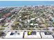 Scenic aerial view of the neighborhood near the beach, showcasing the coastal community and nearby beachfront hotels at 210 Park N Blvd # 129, Venice, FL 34285