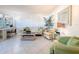 Relaxing living room with light colored sofa and tiled floors at 210 Park N Blvd # 129, Venice, FL 34285