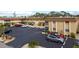 Aerial view of the building and surrounding parking lot at 210 Park N Blvd # 129, Venice, FL 34285
