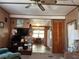 Living room features a view into the kitchen and dining area at 227 Inner E Dr, Venice, FL 34285