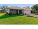 Newly built home with a well-maintained front lawn at 3524 Brownwood Ter, North Port, FL 34286