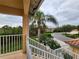 Screened balcony overlooking a tranquil pond and trees at 4215 Vicenza Dr # D1, Venice, FL 34293