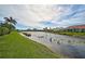 View of the peaceful canal with lush vegetation at 4361 Via Del Santi, Venice, FL 34293