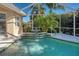 Relaxing pool and spa with a cascading water feature at 455 Otter Creek Dr, Venice, FL 34292