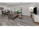 A bright and open living space with modern finishes, a dining table and lots of natural light at 510 Harbor S Dr, Venice, FL 34285