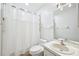 Clean bathroom with shower/tub combo, toilet and vanity at 6796 Gasparilla Pines Blvd # 62, Englewood, FL 34224