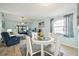 Open concept dining area with view of the living room at 6796 Gasparilla Pines Blvd # 62, Englewood, FL 34224