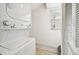 Stackable washer and dryer in a compact laundry room at 6796 Gasparilla Pines Blvd # 62, Englewood, FL 34224