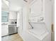White stackable washer and dryer, conveniently located at 6796 Gasparilla Pines Blvd # 62, Englewood, FL 34224