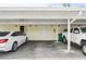 Covered parking area with assigned space for residents at 6796 Gasparilla Pines Blvd # 62, Englewood, FL 34224