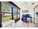 Sunroom with workspace and view of backyard at 6796 Gasparilla Pines Blvd # 62, Englewood, FL 34224