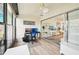 Bright sunroom features a workspace and access to living room at 6796 Gasparilla Pines Blvd # 62, Englewood, FL 34224