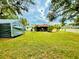 Spacious backyard with shed and plenty of green space at 7339 Cameo Cir, North Port, FL 34291