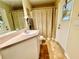 Bathroom with shower, toilet, and single sink vanity at 7339 Cameo Cir, North Port, FL 34291