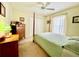 Charming bedroom with a double bed and a wooden dresser at 7339 Cameo Cir, North Port, FL 34291