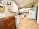 White kitchen with ample counter space and storage at 7339 Cameo Cir, North Port, FL 34291