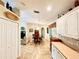 Open floor plan showing kitchen, dining area and living room at 7339 Cameo Cir, North Port, FL 34291