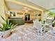 Spacious patio with hot tub and seating area at 7339 Cameo Cir, North Port, FL 34291