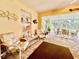 Relaxing screened patio with seating area and view at 7339 Cameo Cir, North Port, FL 34291