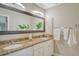 Bathroom with double vanity and granite countertop at 784 Sarabay Rd # 18, Osprey, FL 34229