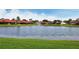 Community lake view with lush green space at 784 Sarabay Rd # 18, Osprey, FL 34229