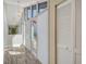 Light and bright entryway with wood-look floors and built-in storage at 784 Sarabay Rd # 18, Osprey, FL 34229