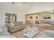Bright living room with vaulted ceilings, tile floors, and access to a screened porch at 784 Sarabay Rd # 18, Osprey, FL 34229