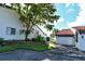 Private garage and lush landscaping at 784 Sarabay Rd # 18, Osprey, FL 34229