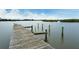 Community boat dock with seating area at 784 Sarabay Rd # 18, Osprey, FL 34229