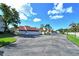 Residential community with paved road and landscaping at 784 Sarabay Rd # 18, Osprey, FL 34229