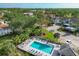 Aerial view of community pool and surrounding buildings at 815 Montrose Dr # 103, Venice, FL 34293