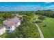 Overhead view of the condo community with access to lush golf course at 815 Montrose Dr # 103, Venice, FL 34293