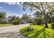 Well-maintained condo community with mature trees, green lawns, and convenient parking at 815 Montrose Dr # 103, Venice, FL 34293