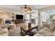 Open-concept living area with views of the kitchen and dining space, perfect for entertaining at 815 Montrose Dr # 103, Venice, FL 34293