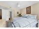 Spacious main bedroom boasts natural light, a queen bed, and a serene ambiance at 815 Montrose Dr # 103, Venice, FL 34293