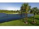 Golf course with palm trees and water features at 815 Montrose Dr # 103, Venice, FL 34293