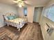 Bedroom with queen bed, ceiling fan and closet at 818 Bogie, Venice, FL 34285