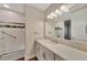 Bathroom with single vanity, quartz countertop and a shower/tub combo at 830 The Esplanade N # 203, Venice, FL 34285