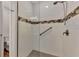 Walk-in shower with glass enclosure and modern fixtures at 830 The Esplanade N # 203, Venice, FL 34285