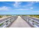 Boardwalk leading to a beautiful, sandy beach at 830 The Esplanade N # 203, Venice, FL 34285