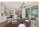 Spacious dining area with hardwood floors and ocean view at 830 The Esplanade N # 203, Venice, FL 34285