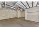 Large garage with high ceilings and ample space at 830 The Esplanade N # 203, Venice, FL 34285