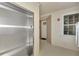 Interior hallway with elevator and unit access at 830 The Esplanade N # 203, Venice, FL 34285