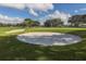 Well-maintained sand trap on the golf course at 885 Country Club Cir # 61, Venice, FL 34293