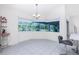 Bright breakfast nook with tile floors and view of the pool area at 8920 Bantry Bay Blvd, Englewood, FL 34224