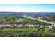 Aerial view of homes near water at 9920 Sheltering Spruce St, Englewood, FL 34223